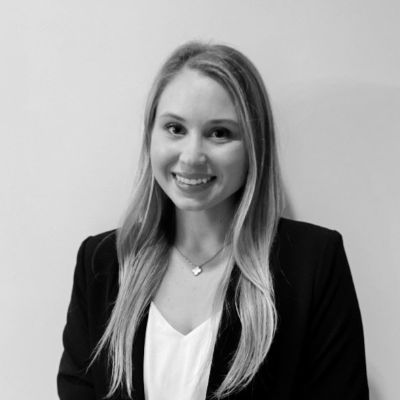 Caprice Herjavec posted a picture on LinkedIn wearing a black suit.